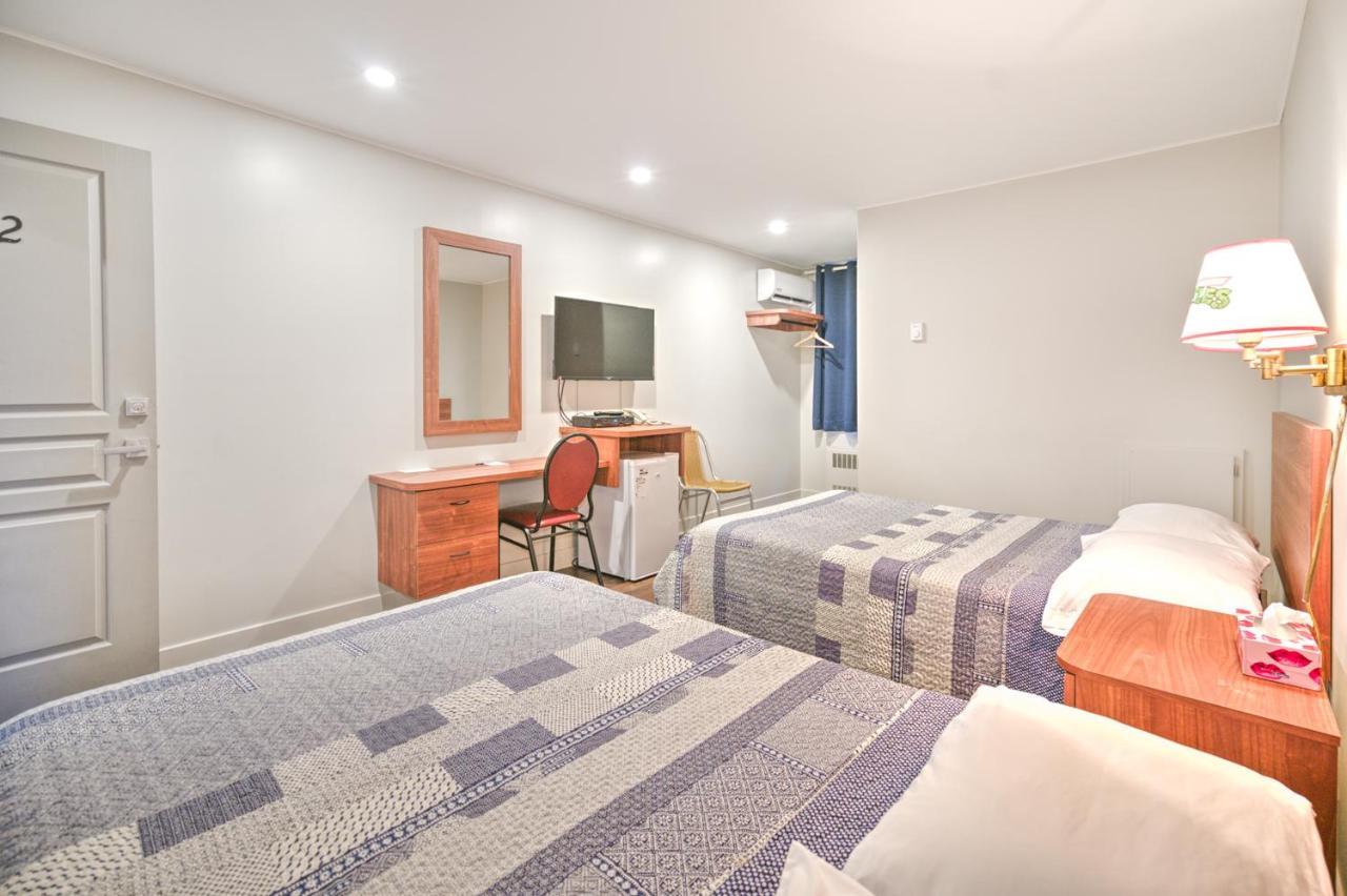 Motel Rustik Chateauguay Heights Bagian luar foto